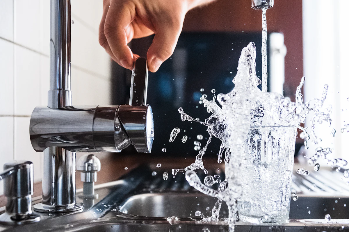 Water running from a kitchen faucet