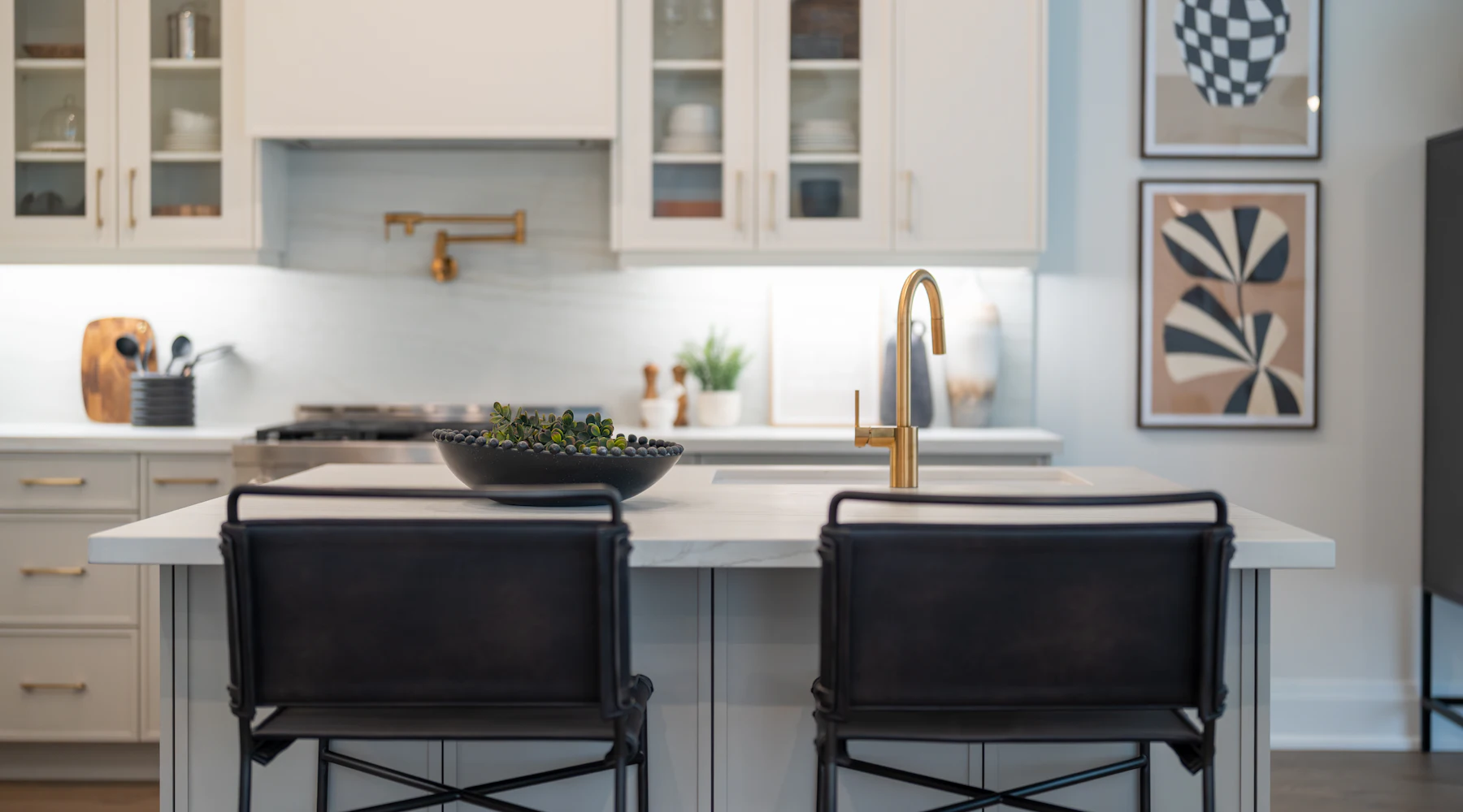 Remodeled kitchen with island and bar stools