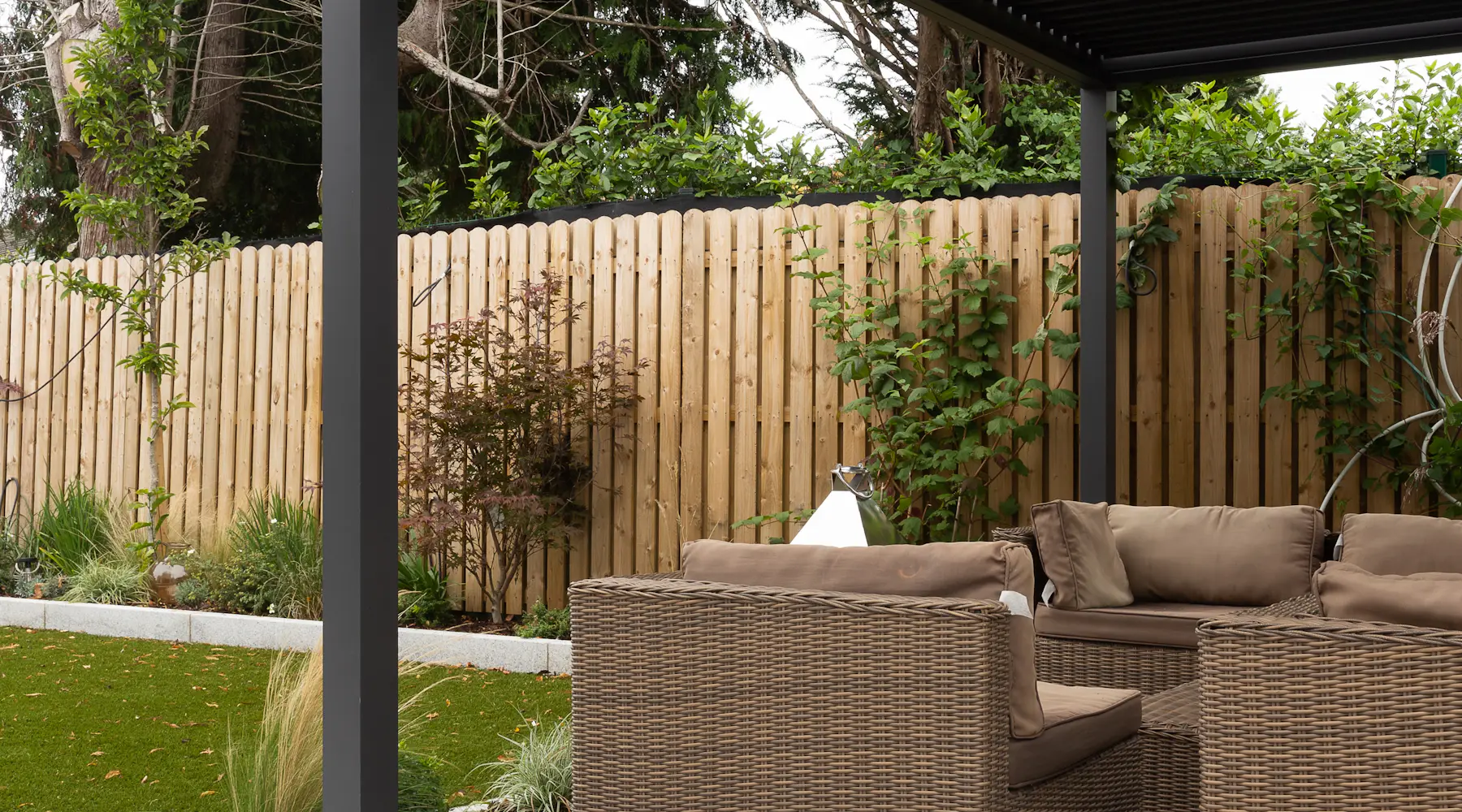 Covered backyard patio with outdoor seating