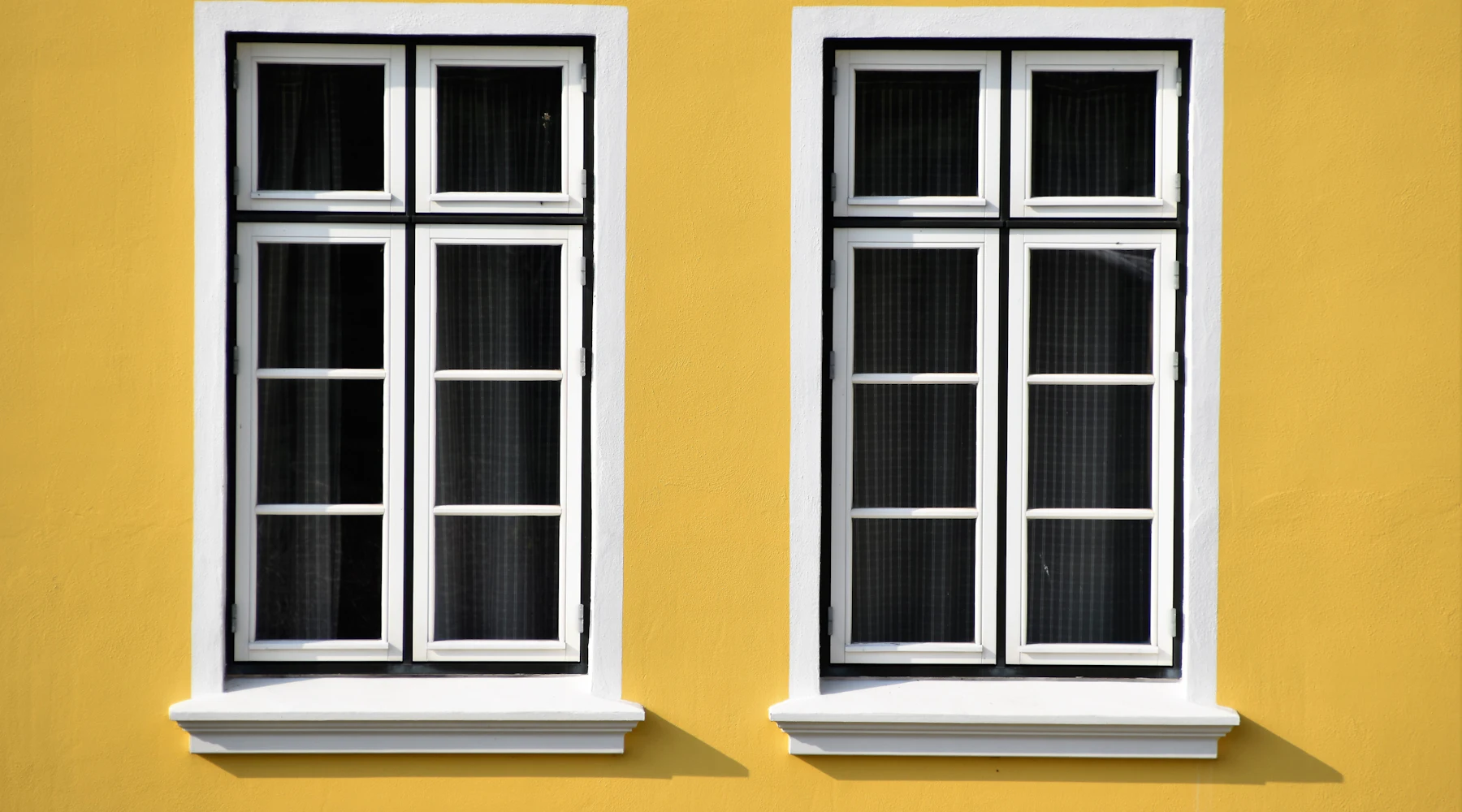 New white windows on a home exterior